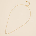 Gold Pearl Charm Necklace